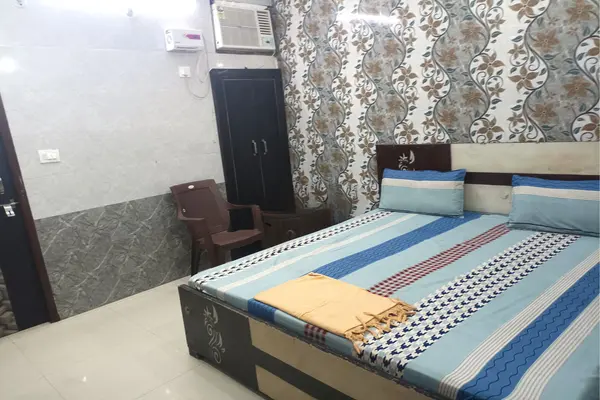 Deluxe shared room at Shree Akhil Bharatiya Ahir Seva Samaj Trust Dwarka Gujarat